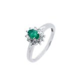 White gold, emerald and diamonds ring