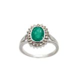 White gold, emerald and diamonds ring