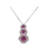 White gold, pink sapphires and diamonds pendant