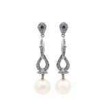 White gold, diamonds and cultured pearl earrings