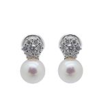 White gold, diamonds and cultured pearl earrings