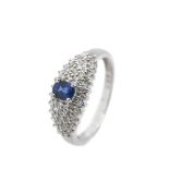 White gold, diamonds and blue sapphire ring