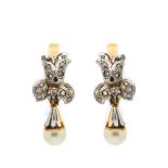 Gold, platinum, diamonds and cultured pearl earrings