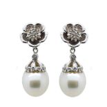White gold, diamonds and pearl flower earrings