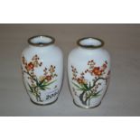 Pair of small 20th Century Japanese cloisonne and white metal mounted baluster form vases decorated