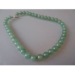 Single row uniform green jade bead necklace