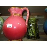 Large Sarreguemines pottery water jug decorated with a turquoise glaze together with a similar pink