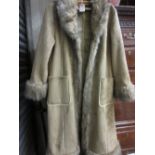 Three quarter length fur trimmed suede coat with embroidered decoration