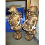 Pair of gold painted plaster figures of children with puppies and kittens (one a/f)