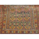 Small Afghan Belouch rug with all-over stylised floral design together with a small Afghan Belouch