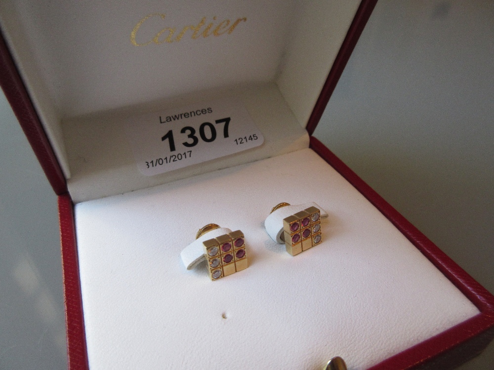 Pair of Cartier 18ct rose gold diamond and pink sapphire set ear studs with a Cartier box