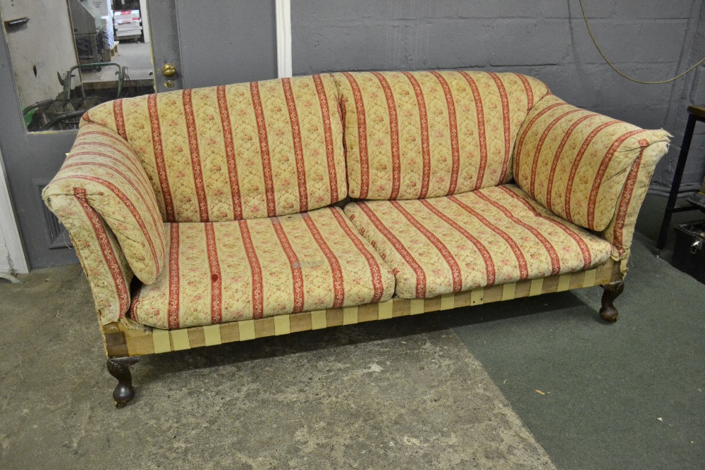 Howard and Sons ' The Fielding ' two seat sofa circa 1910 with fitted cushions to back and side and