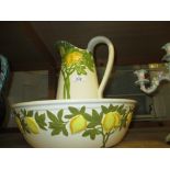 Sarreguemines pottery jug and basin decorated with a lemon tree design