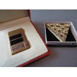 Dupont cigarette lighter in original box together with a modern Faberge compact in original box