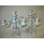 Pair of late 19th / early 20th Century continental porcelain four light candelabra decorated with