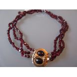 Victorian child's garnet set necklace with earrings