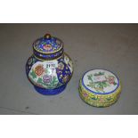 Chinese Canton enamel baluster form jar and cover decorated with panels of flowers and insects on a