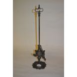 Middle Eastern bronze oil lamp with loop handle and petal form base,