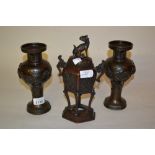 Pair of late 19th Century Japanese dark patinated bronze baluster form vases decorated in high