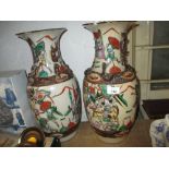 Pair of 19th Century Chinese crackleware vases decorated with warriors,