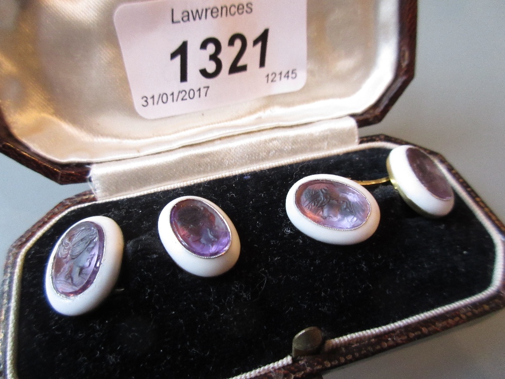 Pair of French yellow gold cufflinks set with four carved amethyst portrait panels