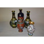 Pair of late 19th or early 20th Century cloisonne bottle vases decorated with stylised flowers on a