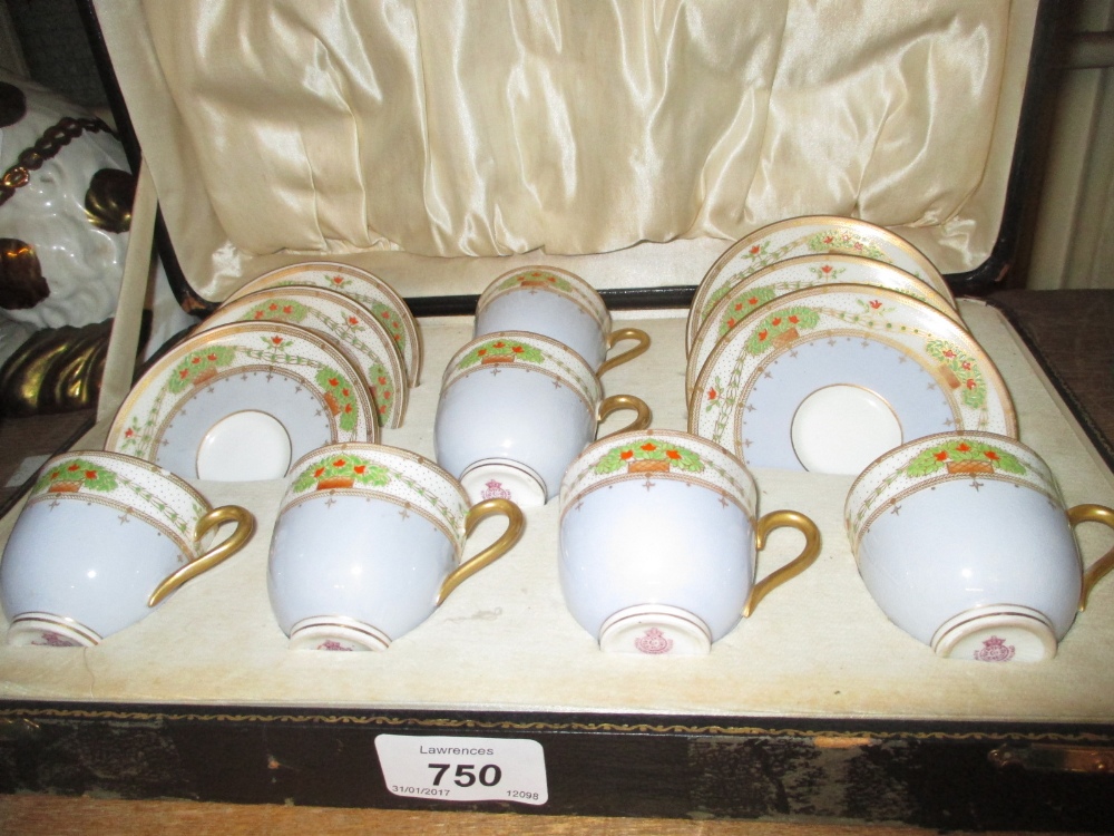 Cased set of six Royal Worcester coffee cups and saucers,