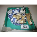 Five various figures of Disney characters and a miniature blue and white teaset on tray
