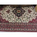 Good quality modern central Persian carpet with a lobed medallion and all-over floral design on an