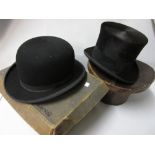 19th Century leather hat case with top hat,