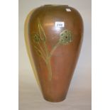 Large Arts and Crafts beaten copper baluster form vase with brass floral inlaid decoration