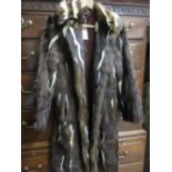 Ladies three quarter length dark brown and cream fur coat