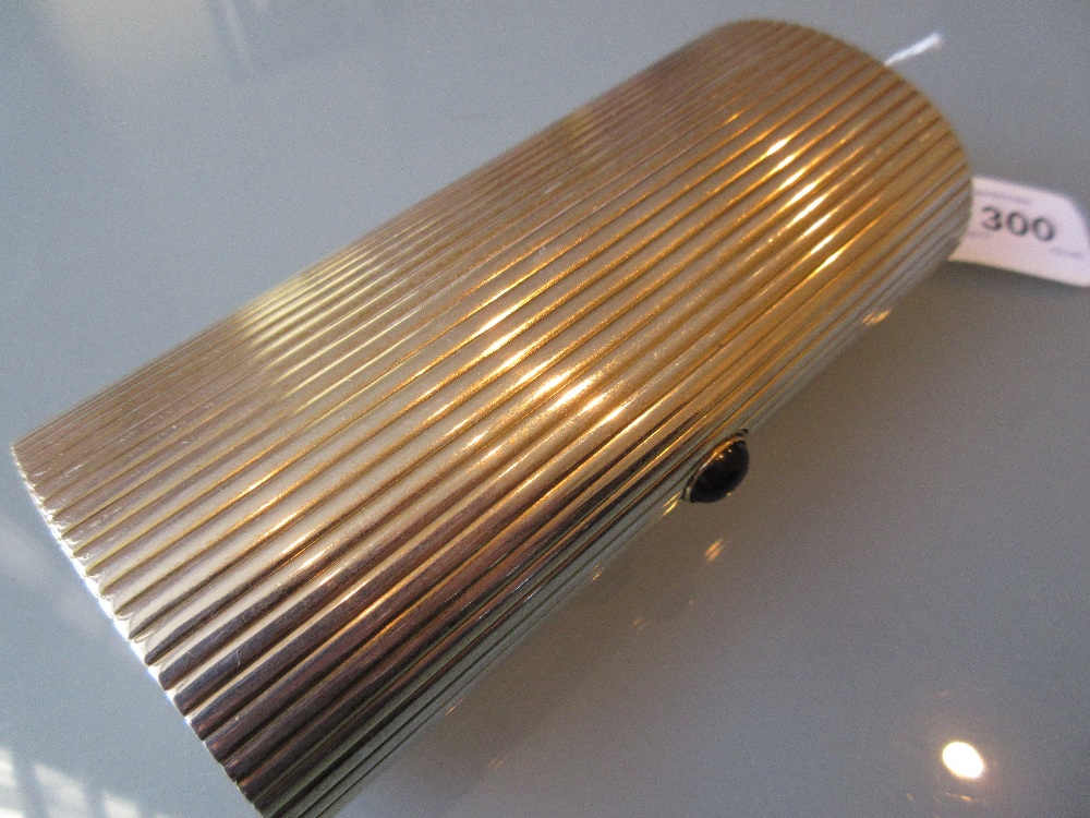 Continental silver (925 mark) vanity case of oval ribbed design with a cabochon clasp,