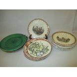 Set of four Sarreguemines plates decorated with French Medieval scenes,