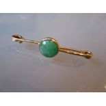 Circular jadeite set bar brooch