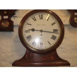 19th Century mahogany and oak circular dial clock with platform base,