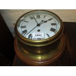 Oak and brass ship's bulk head clock,