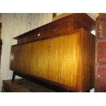 1960's G-plan ebonised and teak sideboard with an arrangement of drawers and cupboards,