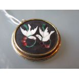 Circular pietra dura brooch decorated with a pair of doves,