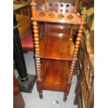 Victorian walnut three tier buffet on tapering spiral twist columns with drawer raised on turned