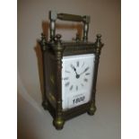 20th Century brass cased carriage clock having enamel dial with Roman numerals (cracked corner of