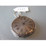 Ladies Continental silver fob watch with floral engraved case and silvered dial