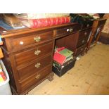 Early 20th Century mahogany twin pedestal desk with a leather inset top,