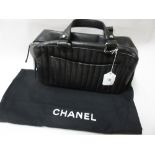 Ladies Chanel black leather handbag