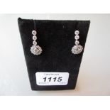 Pair of 18ct white gold diamond cluster drop earrings, approximately 1.