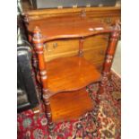 Small Victorian mahogany three tier whatnot with shaped shelves and baluster turned uprights
