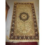 Small Indo Persian rug with medallion and floral design on an ivory ground together with a small