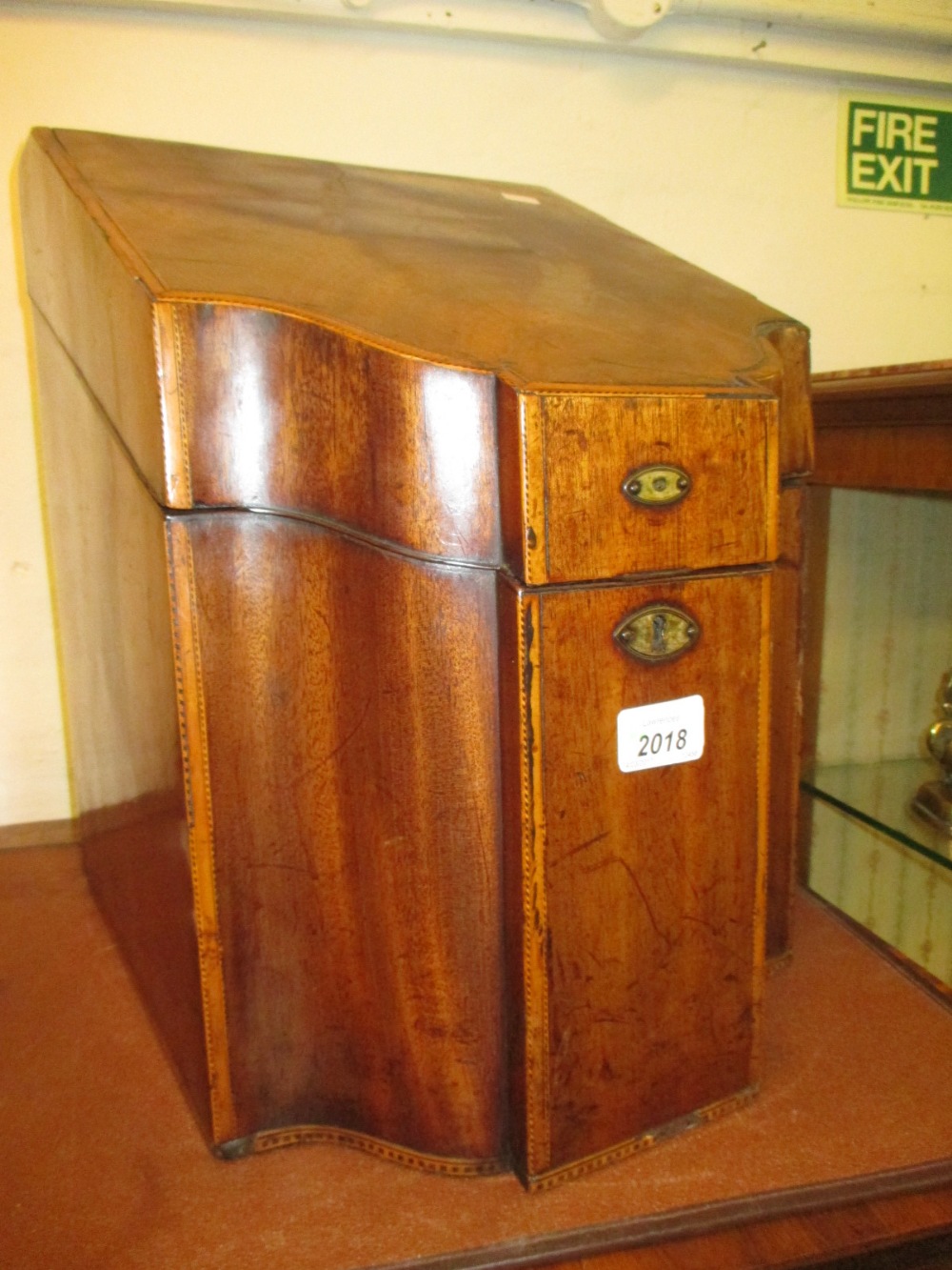 George III mahogany satinwood crossbanded and chequer line inlaid decanter box,