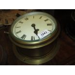 Brass cased ship's bulk head clock,