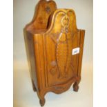 Continental carved fruitwood candle box in the form of a miniature armoire,